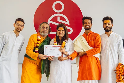 Usha Sing with her 200-Hour Yoga Nidra Teacher Training Certification at Nirvana Yoga School India